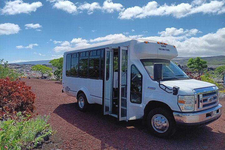 15 passenger bus with cold ac and larger windows for viewing the scenery!