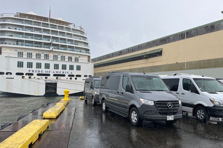 3 of our vans next to the Pride of America.