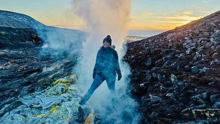 A guest over a fumarole at Fagradalsfjall Volcano Tour