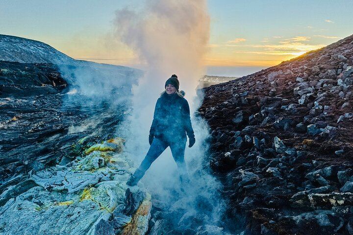 A guest over a fumarole at Fagradalsfjall Volcano Tour