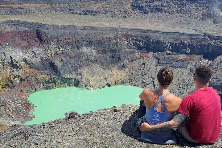Amazing view from the heart of the Santa Ana Volcano crater, a sulfur lagoon comes into view, Surrounded by the steep and rocky walls of the crater.