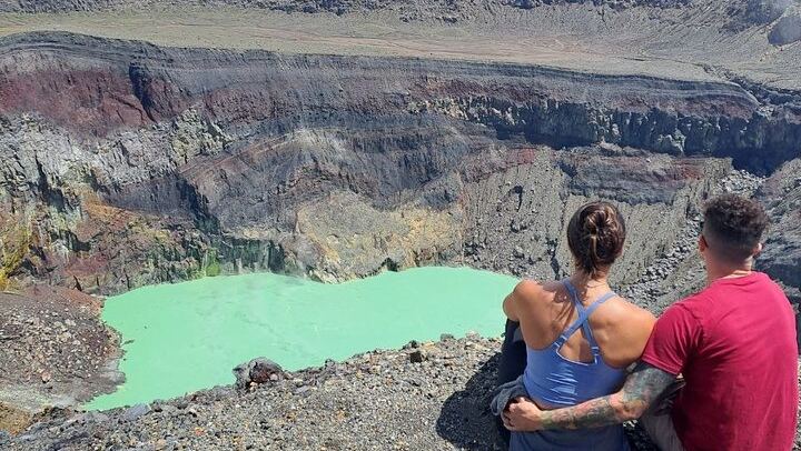 Amazing view from the heart of the Santa Ana Volcano crater, a sulfur lagoon comes into view, Surrounded by the steep and rocky walls of the crater.