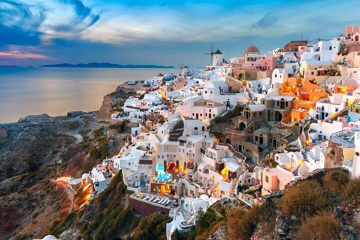 Breathtaking views over the whitewashed cliffs of Oia — where every step feels like a dream, and every glance is a postcard moment.