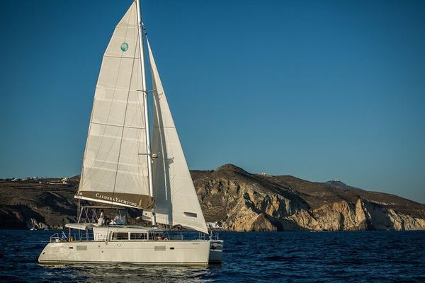 The Day Cruise That Ends at Ammoudi, with an Open Bar