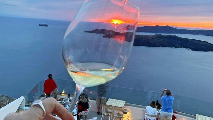 Cheers to another great sunset in Santorini