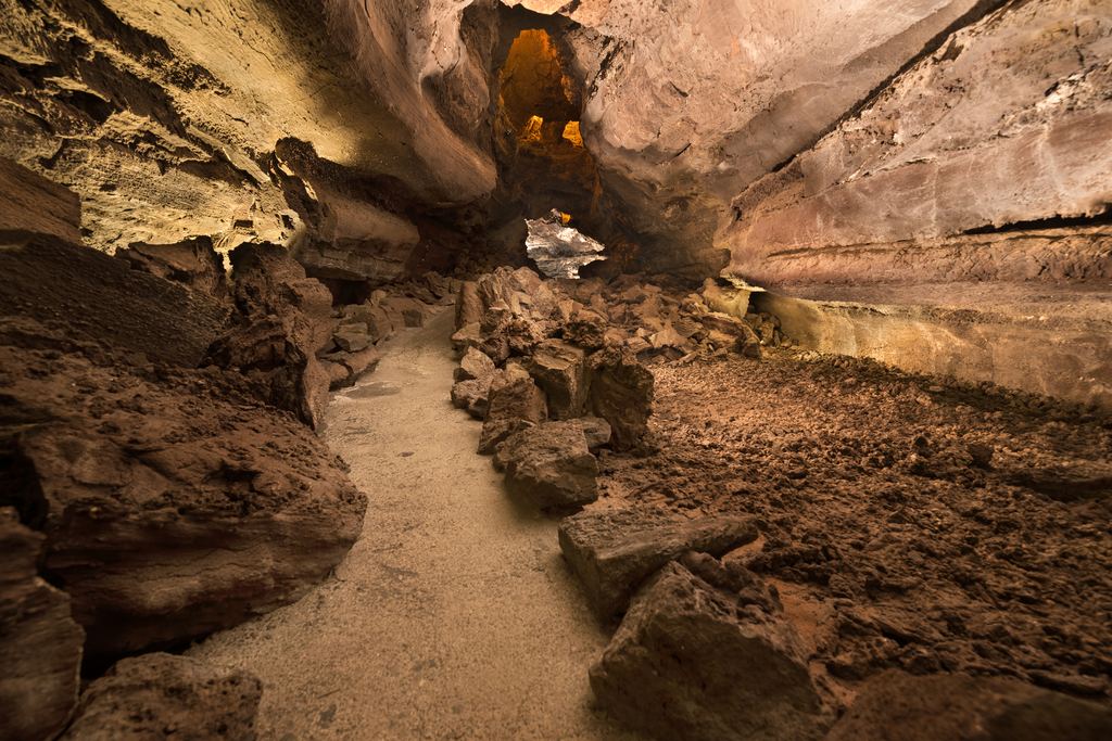 Illuminated interior of the Cueva de los Verdes volcanic lava tube in Lanzarote, Canary Islands