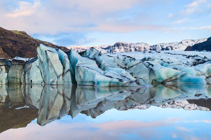Distinct black ash layers from nearby volcanic eruptions make Sólheimajökull one of Iceland’s most unique glaciers
