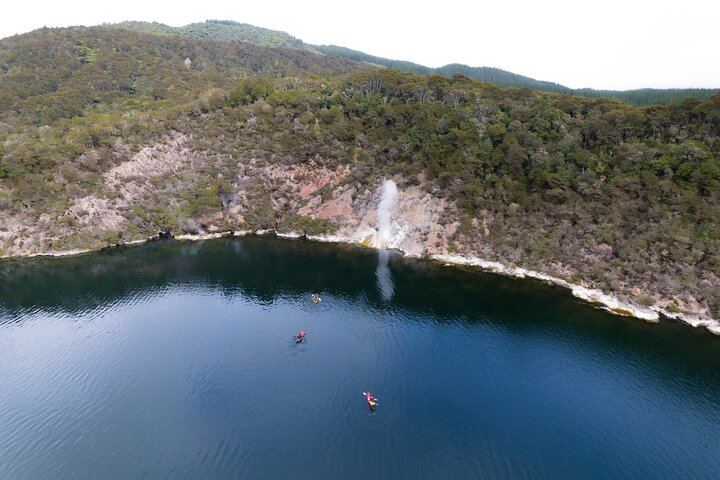 Drone footage of kayakers watching geyser