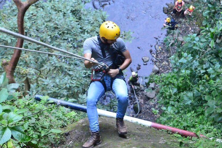 Enjoy the rappel, down by rope!