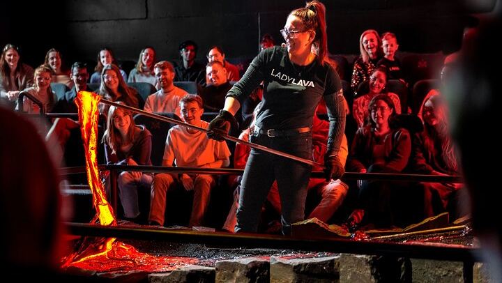 Feel the heat as our Lava Master lifts glowing lava with an iron rod — a one-of-a-kind experience found only in Iceland.
