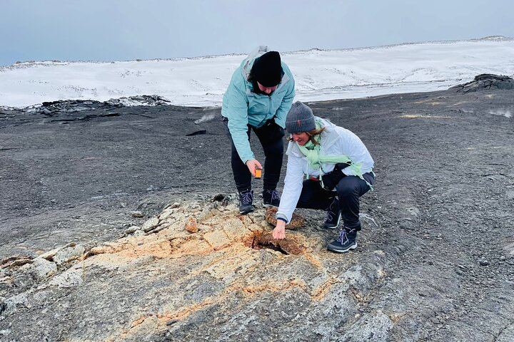 Feeling the heat from a fumarole at Fagradalsfjall Volcano Tour