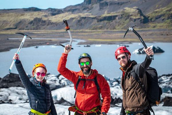 Solheimajokull in a Group of Six: Blue Ice over Black Volcanic Sand