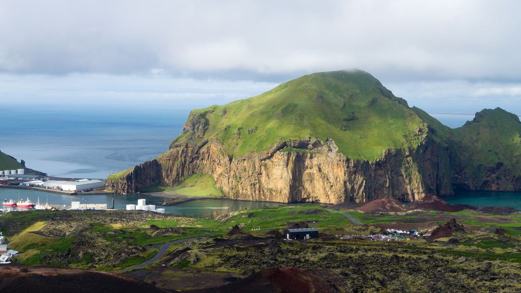 The town of Heimaey seen from the summit of the Eldfell volcanic cone, with the 1973 lava field in the foreground