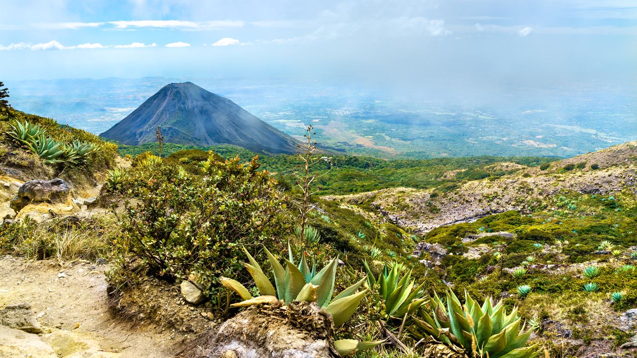 The dark cone of the Izalco volcano seen from Cerro Verde National Park, El Salvador