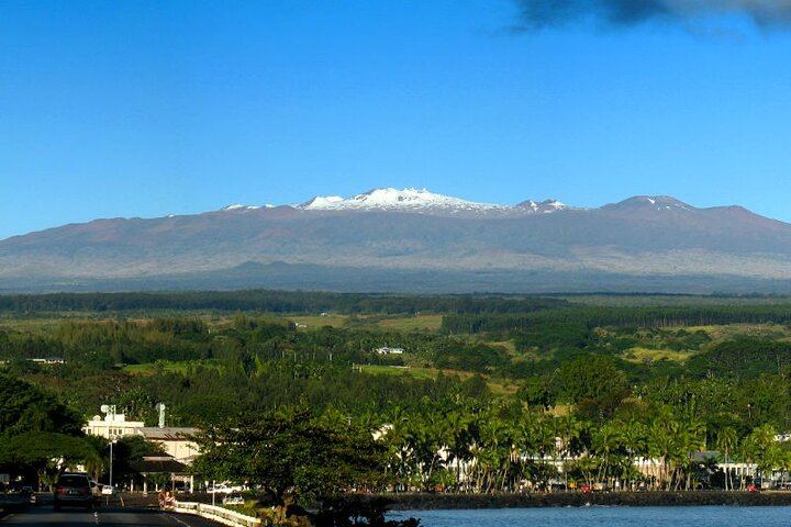 Majestic Maunakea overlooking Hilo bay.