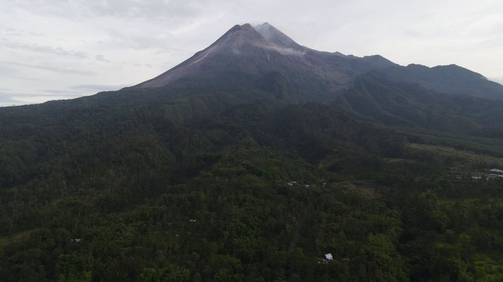 Aerial view of Mount Merapi during a small eruption, Java, Indonesia