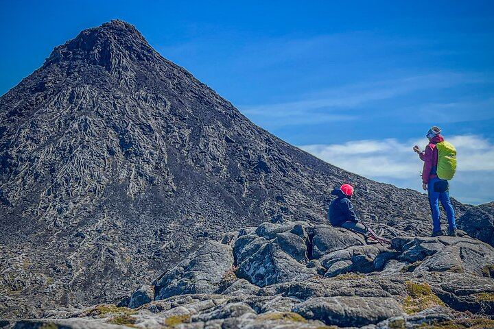 Pause before the final push to Mount Pico's summit.
