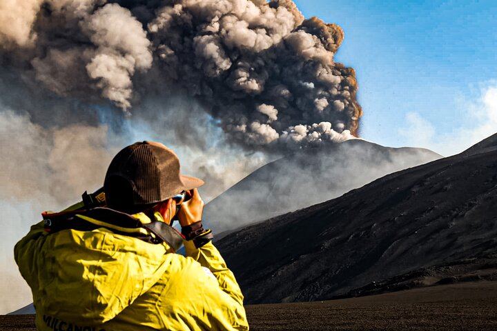 Photographing the explosive activity started at the South East Crater of Etna during the excursion