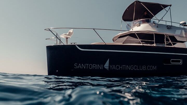 Private Caldera Cruise with Power Catamaran ENJOY incl. Meal & Drinks