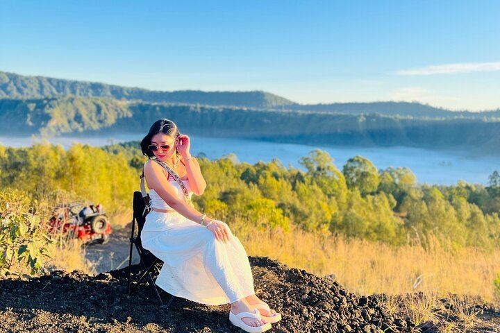Relax and soak in the peaceful morning views of Mount Batur and Lake Batur