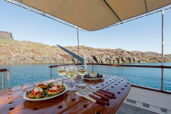 Santorini Caldera Sunset on a Wooden Boat, Ammoudi to Vlychada