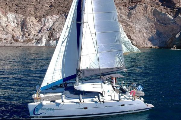 Santorini Catamaran in a Small Group: Snorkel Gear and Dessert