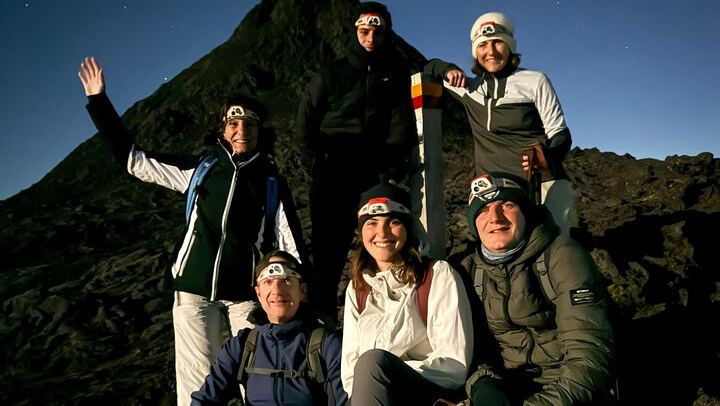 Smiles at an unforgettable night climb on Mount Pico.