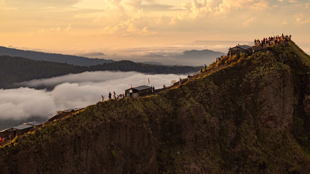 Sunrise over Mount Abang and Lake Batur seen from the rim of Mount Batur, Bali, Indonesia