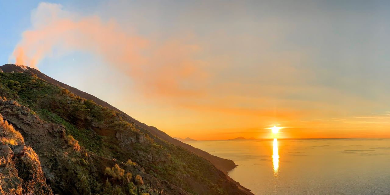 Sunset over Stromboli, the always-active volcanic island of the Aeolian archipelago, Italy
