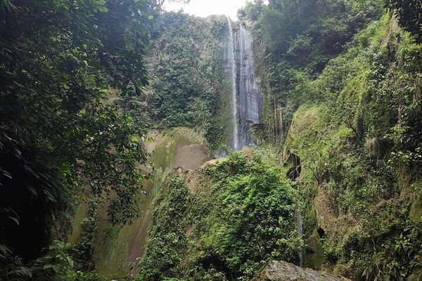 Taal and a Waterfall Behind It: a Rainforest Trail and a Cave Church