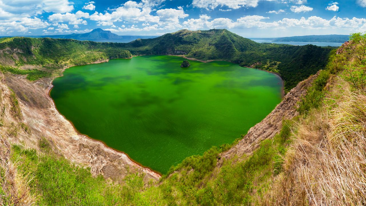 Taal Volcano rising from its lake south of Manila, Philippines