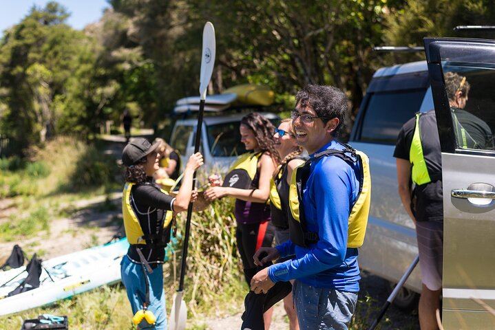 The guide getting the team ready before kayaking begins
