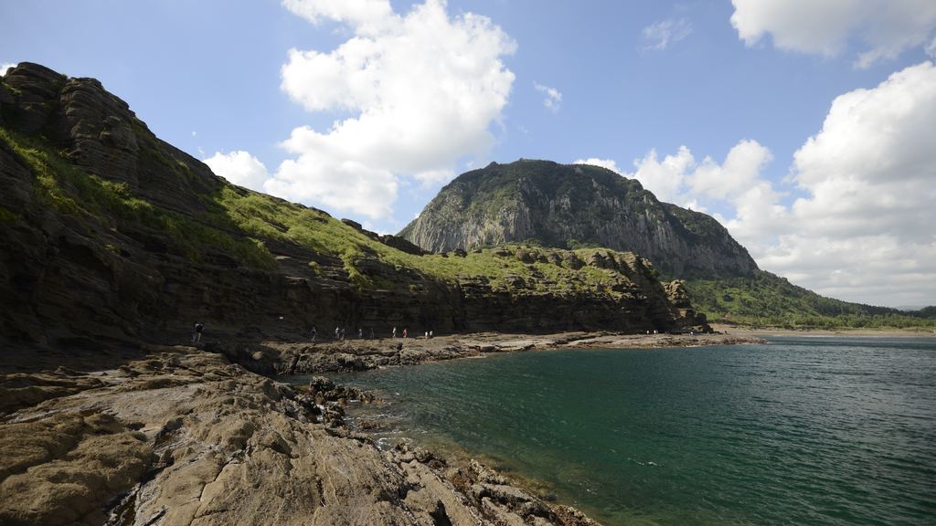 The volcanic landscape of Jeju Island, South Korea, with the shield slopes of Hallasan rising behind