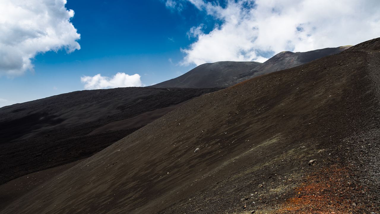 Scoria and lava bombs on the summit slopes, the ground the whole day is spent on.