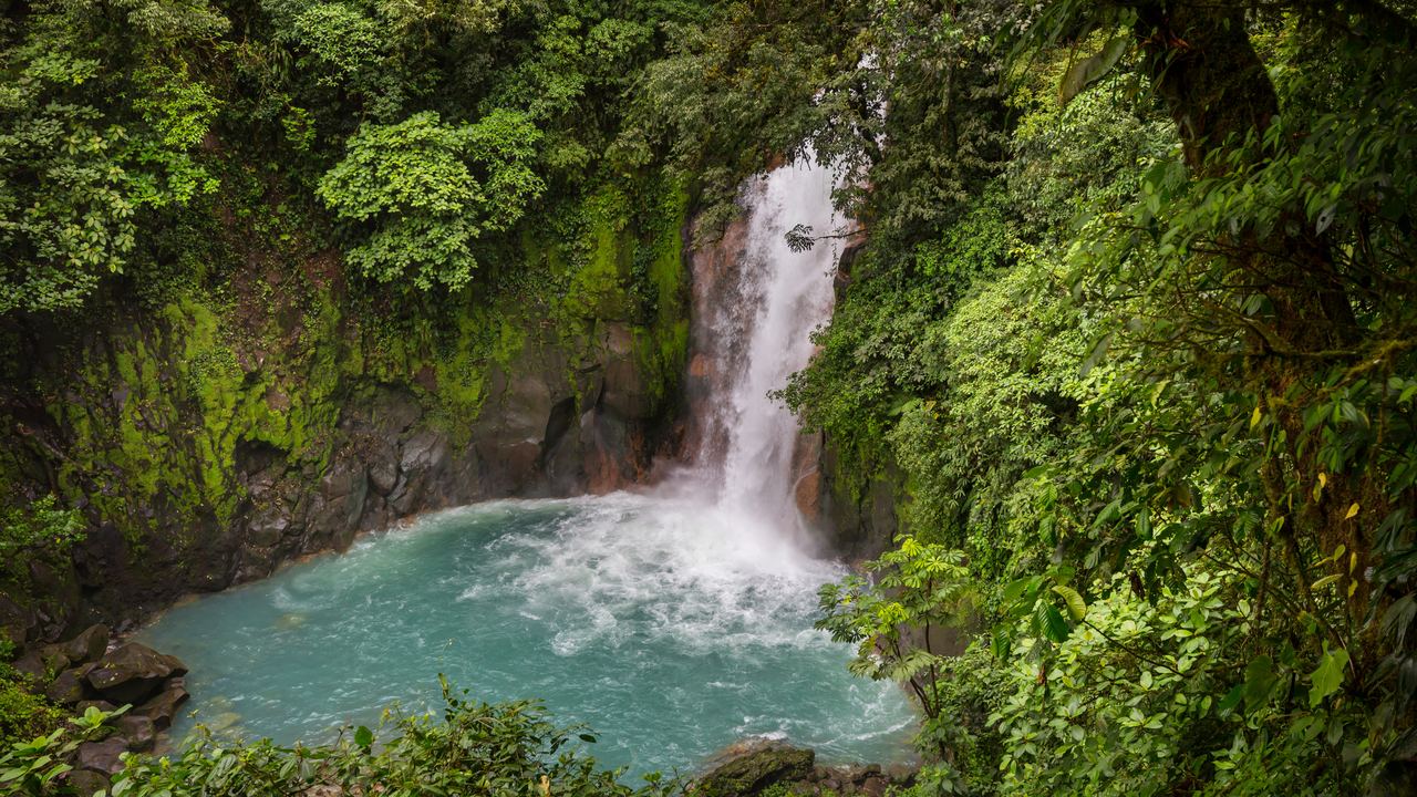 A waterfall in the rainforest of Costa Rica, in the volcanic province of Guanacaste